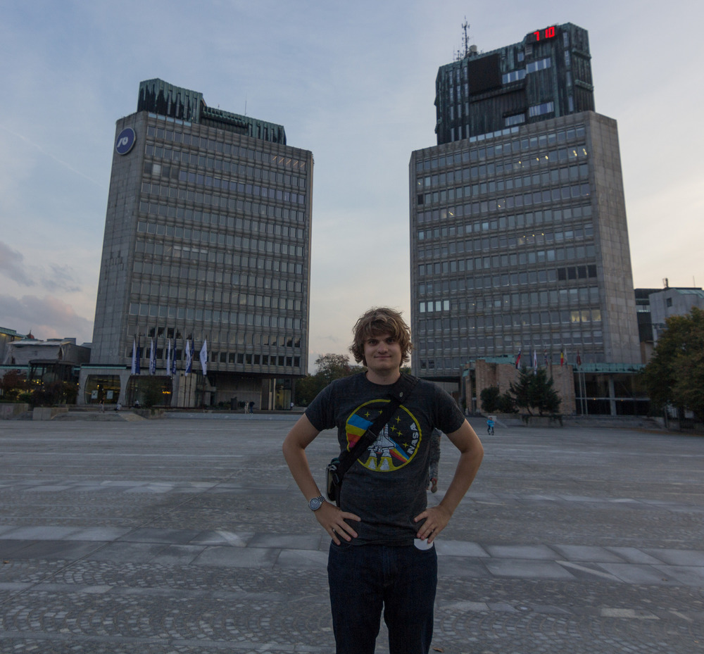 nikky in front of buildings
